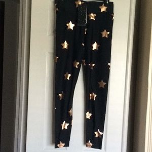 Terez black leggings with gold stars. NWT.